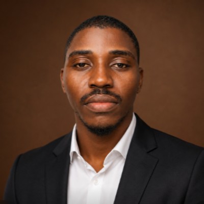 Muiz Olanrewaju wearing a professional suit